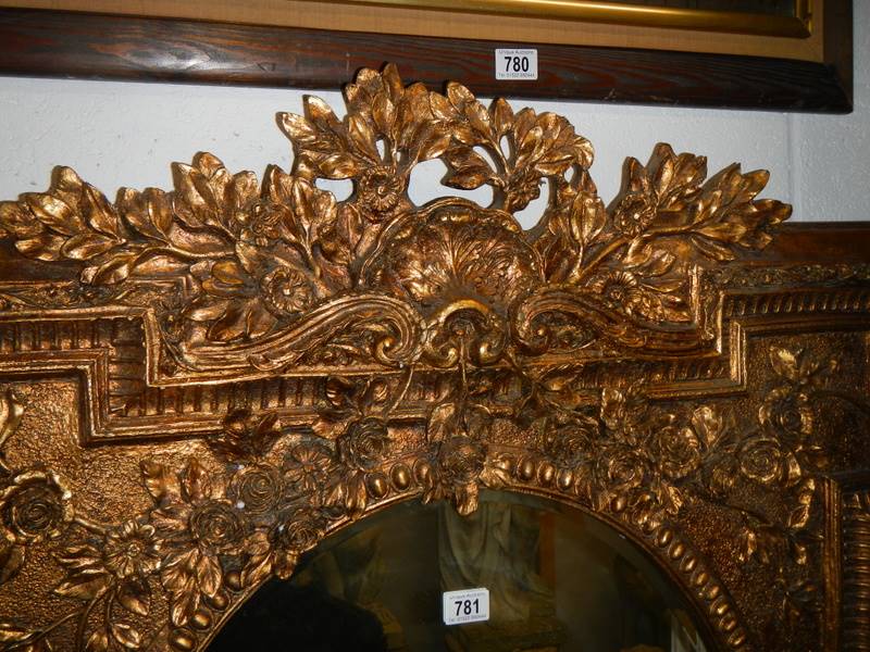 An oval mirror in ornate gilt frame. COLLECT ONLY. - Image 2 of 4