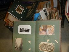A large collection of vintage postcards in albums and loose inc early to mid 20th century ephemera.