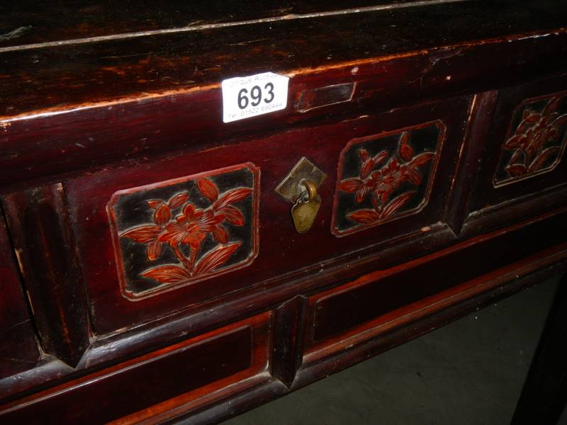 A Chinese carved three drawer hall table. - Image 3 of 3