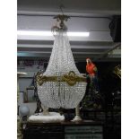 A fabulous brass 'basket' chandelier with over 4000 crystals. COLLECT ONLY.
