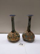 A pair of Doulton Slater vases.