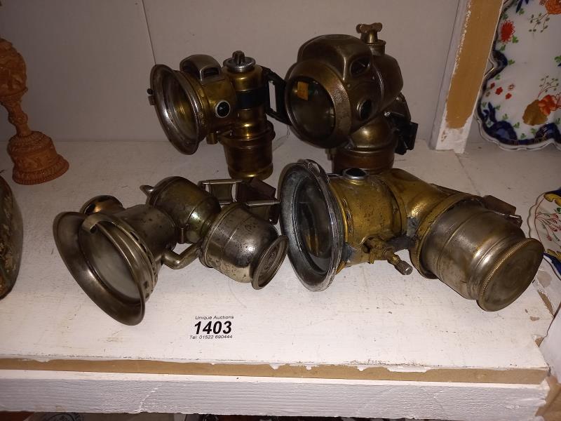 4 early 20th century motorcycle carbide lamps