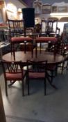 A dark wood stained dining table & 6 others COLLECT ONLY.