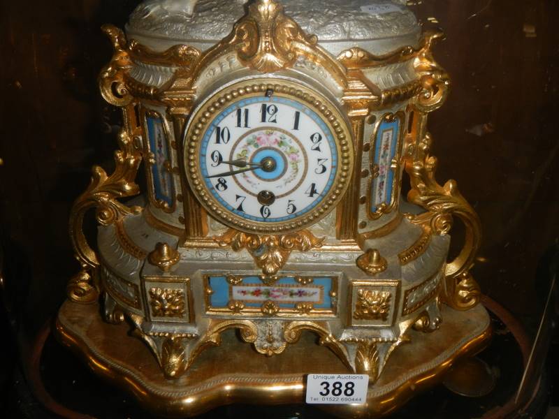 A magnificent French clock garniture under glass domes. The clock surmounted a horse with handler, - Image 2 of 4