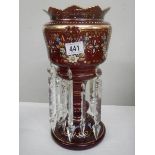 A hand painted ruby glass Victorian lustre.