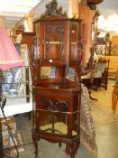 An elegant 19th century mahogany corner cabinet. COLLECT ONLY.