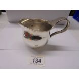 A hall marked silver jug, 5.9 ounces.