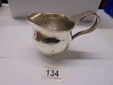 A hall marked silver jug, 5.9 ounces.