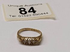 A five stone old cut diamond ring hall marked Birminghan 1912 in 18ct gold, size K, 2.9 grams.