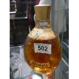 A bottle of Dimple Whisky won in a raffle 60 years ago.