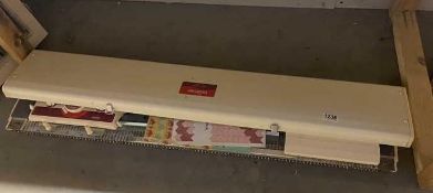A vintage Brother knitting machine with manuals (model KH-230)