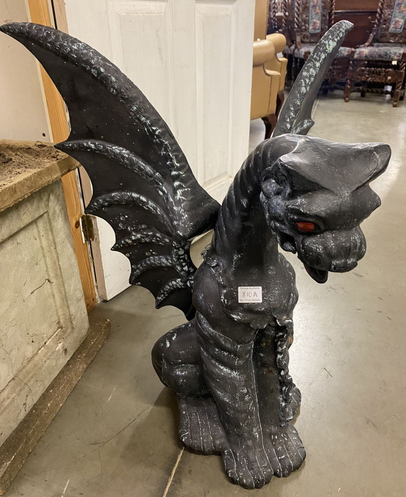 A cast iron statue of a Dragon