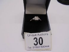 A white gold 15 stone diamond ring, size P, 1.6 grams.