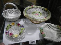 Four ceramic lattice ware items.