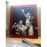 A large black & white print of The Rolling Stones - 58cm x 71cm
