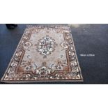 A beige coloured rug - 160cm x 225cm (COLLECT ONLY)