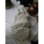 An early Victorian Copeland white porcelain figure complete with wall bracket.
