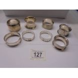 Eight hall marked silver napkin rings, 90 grams.