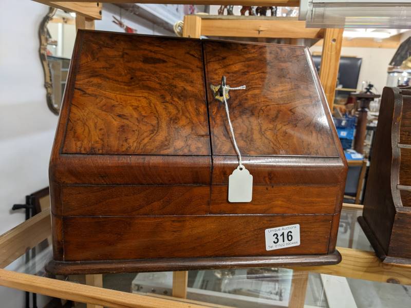 A ladies walnut stationary box.