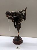 An art deco figure of a dancing girl.