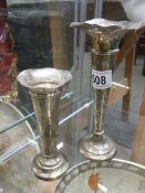 Two silver spill vases.