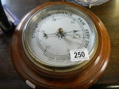 A circular precision barometer.