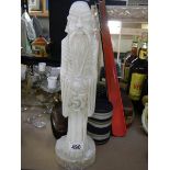 A tall alabaster figure of a Chinese gentleman.