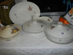Two Royal Doulton Tumbling Leaves pattern tureens, platter etc., and a crinoline lady tureen.