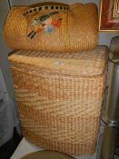 A basket ware linen bin and other basket ware.