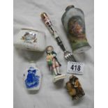 An interesting lot including perfume bottle, figures etc.,