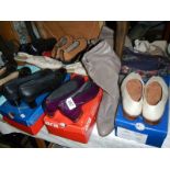 A quantity of boxed shoes including vintage.