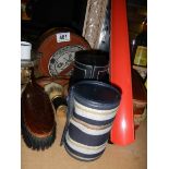 A leather bound collar box, shoe horn, brushes etc.,