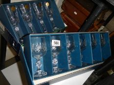 Two boxed sets of new drinking glasses.