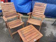 2 wooden chairs and matching table