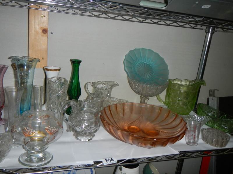 A shelf of glass ware.