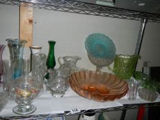 A shelf of glass ware.