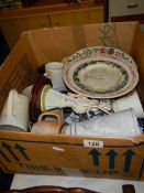 A box of miscellaneous ceramics.