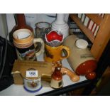 A mixed lot including Wade Bells, stoneware hot water bottle etc.,