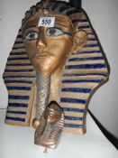 A Tut-Ankh-Amun death mask and a smaller example.