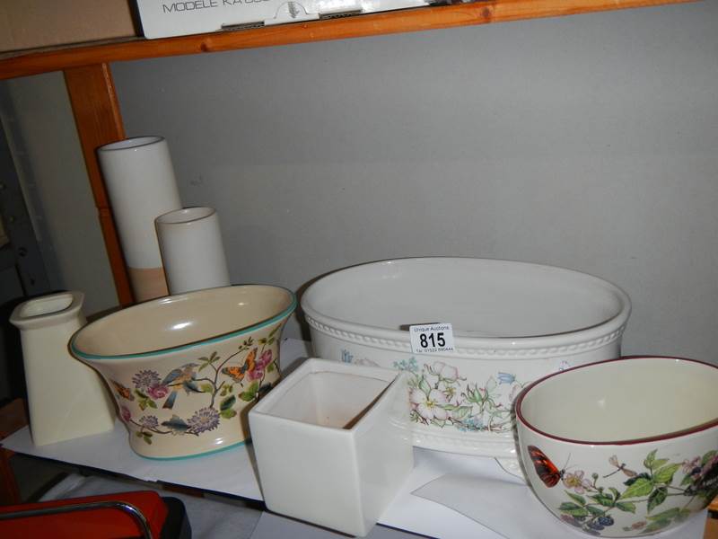 A shelf of ceramics.