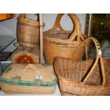 A quantity of wicker baskets.