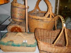 A quantity of wicker baskets.