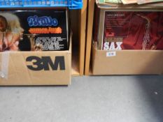 Two boxes of LP records.