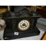 A slate mantle clock. COLLECT ONLY.