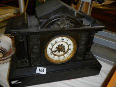 A slate mantle clock. COLLECT ONLY.