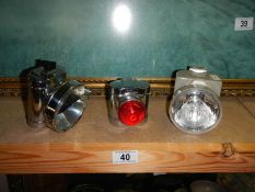 Two front and one rear cycle lamps.