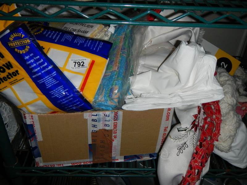A box of assorted bedding