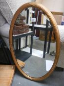 An early 20th century bevel edged mirror. COLLECT ONLY.