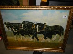 A gilt framed study of four heavy horses. COLLECT ONLY.