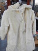A Faux fur child's coat.